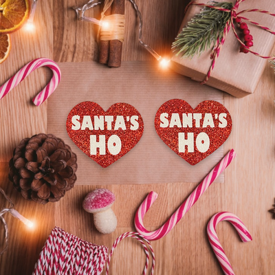 santas ho red heart pasties on a christmas table